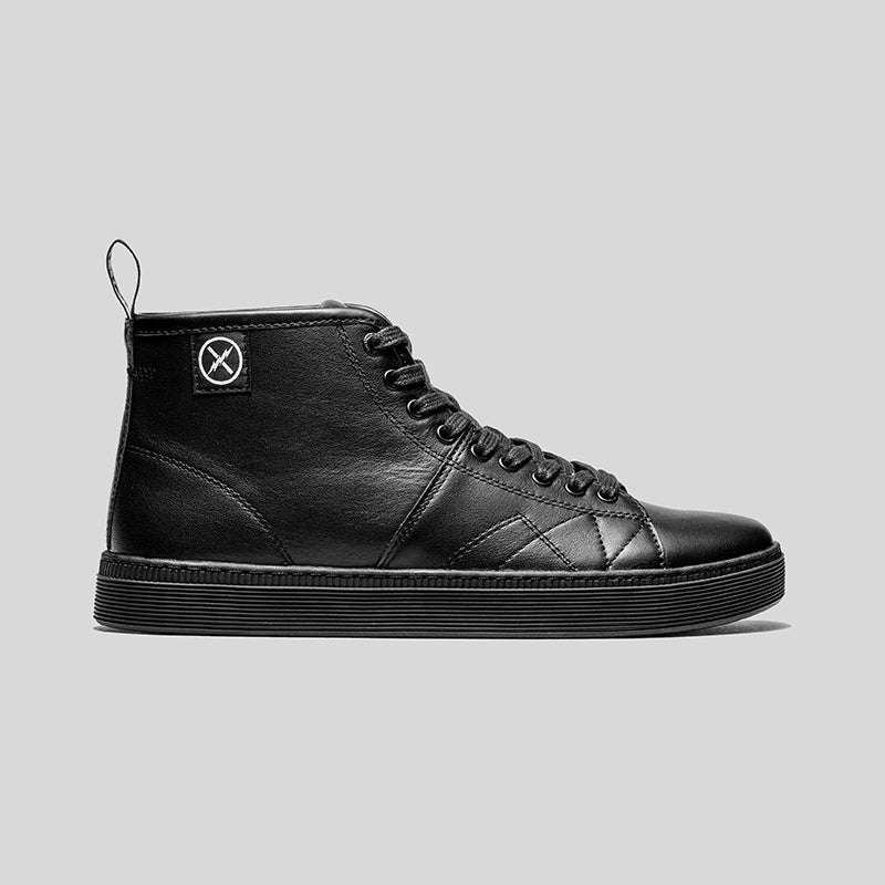 Side view of the CNTRL high-top black leather shoe by FACT., showing lace-up design and control-pattern cupsole.