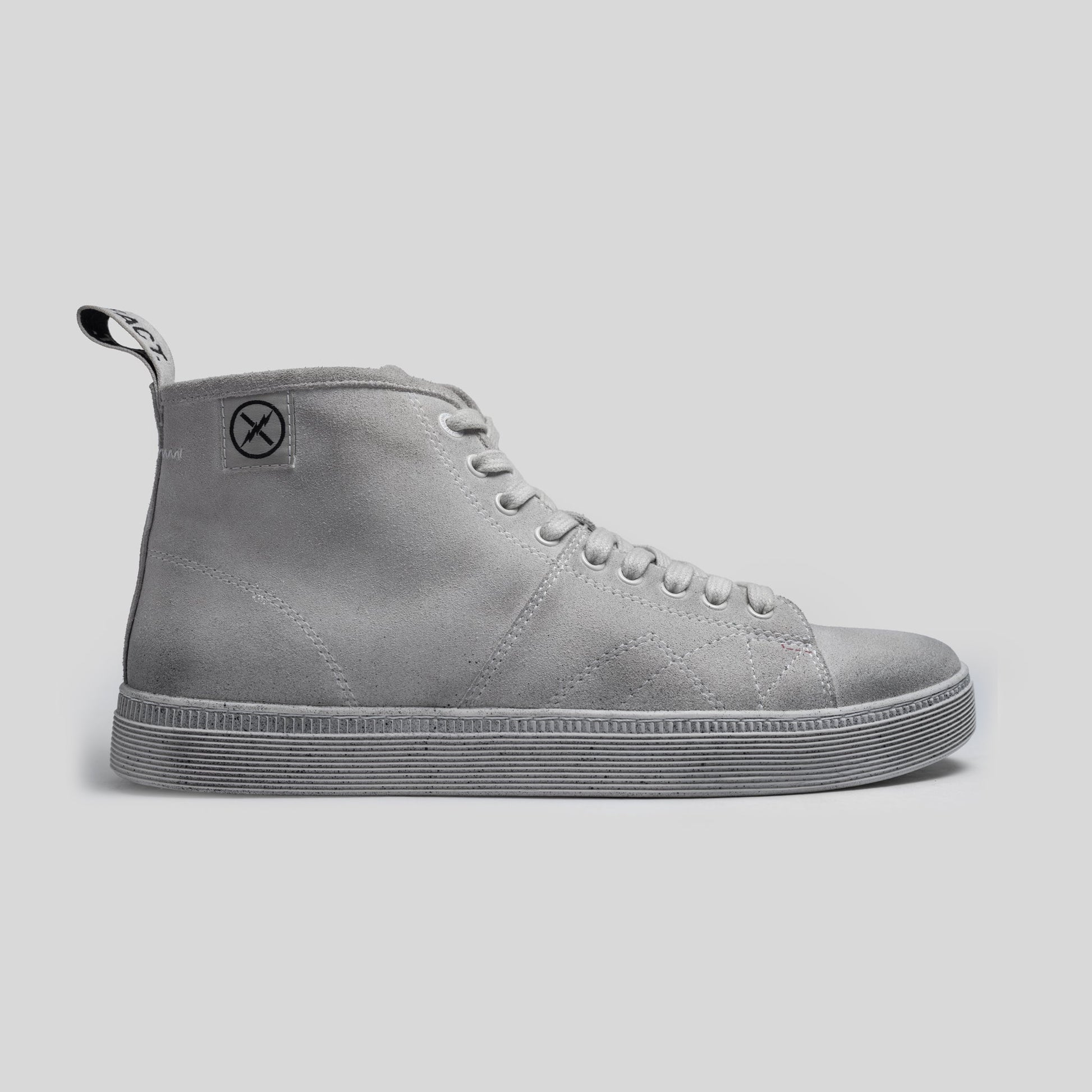Side view of the CNTRL high-top boot by FACT. in Dirty White Suede