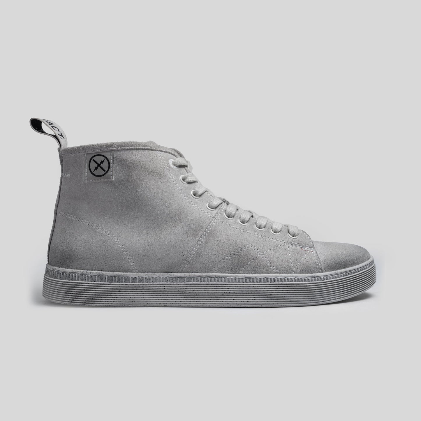 Side view of the CNTRL high-top boot by FACT. in Dirty White Suede