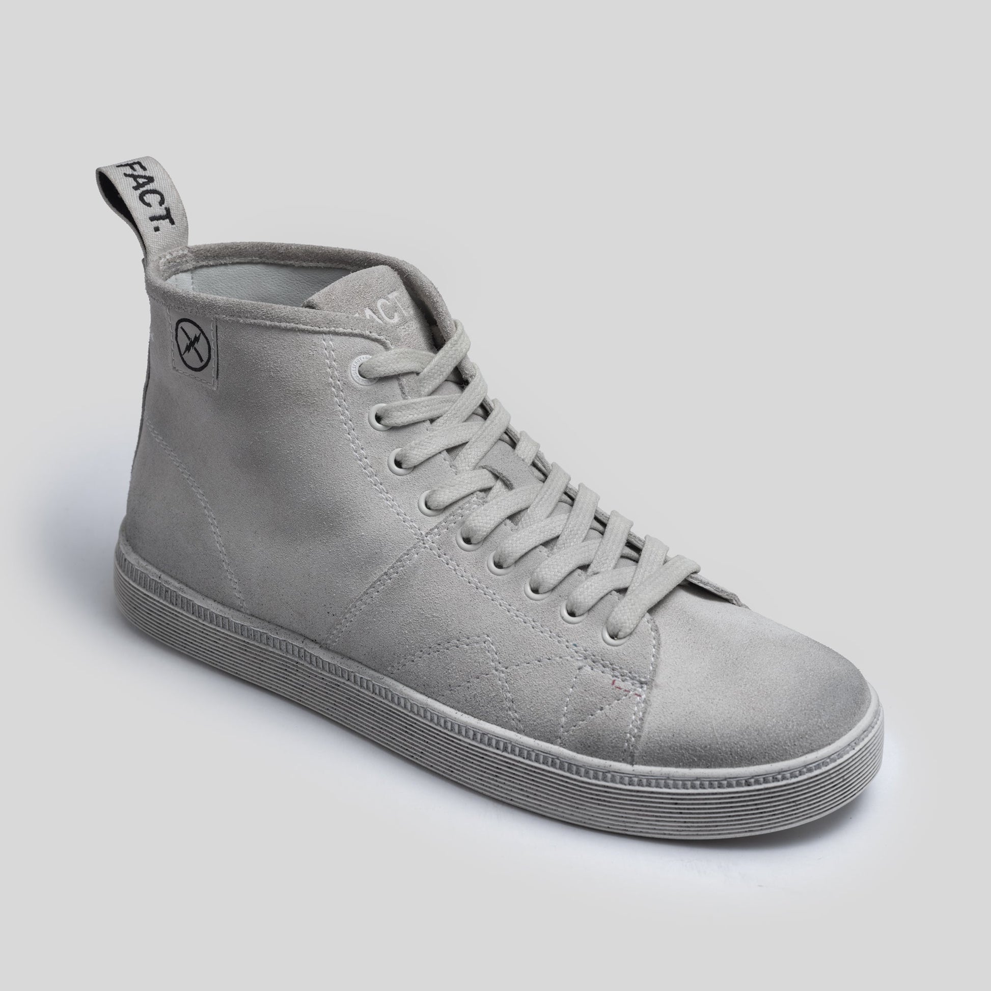 Angled view of the CNTRL high-top boot by FACT. in Dirty White Suede