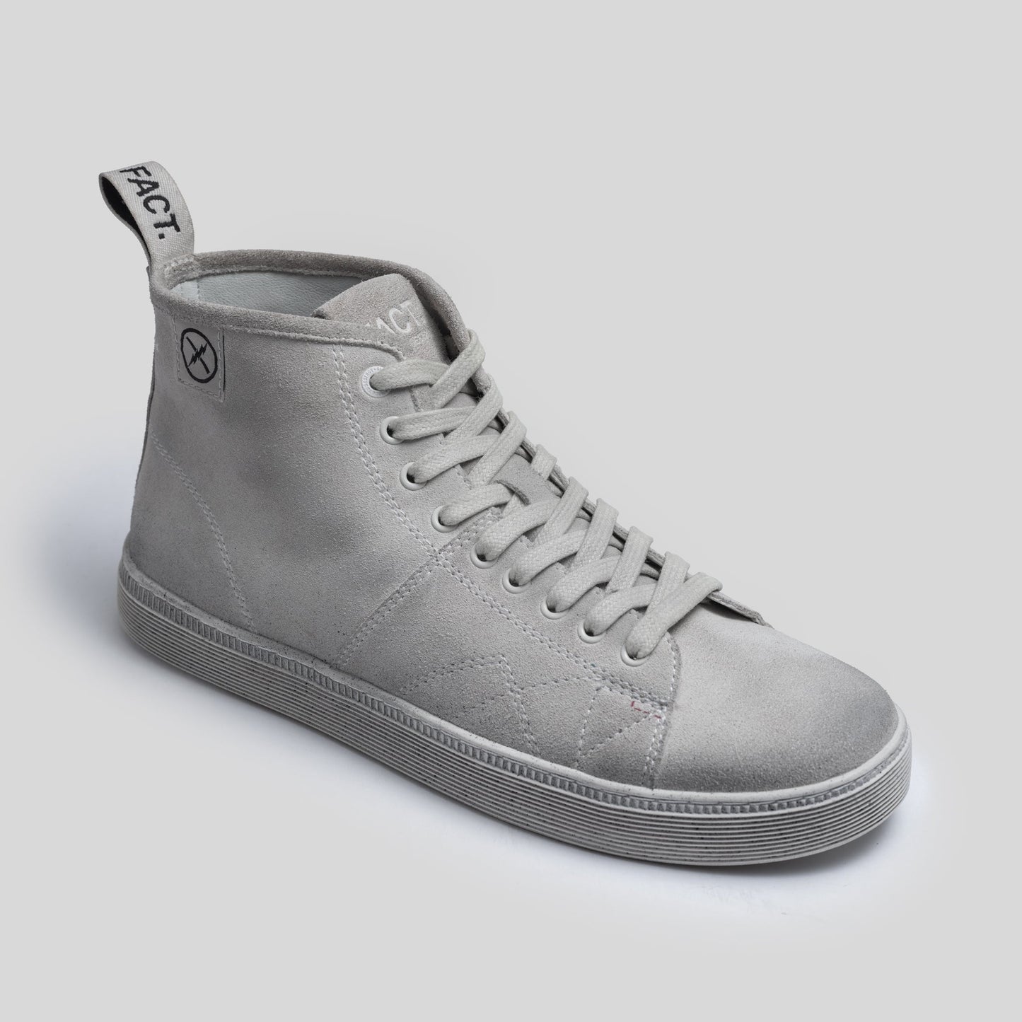 Angled view of the CNTRL high-top boot by FACT. in Dirty White Suede