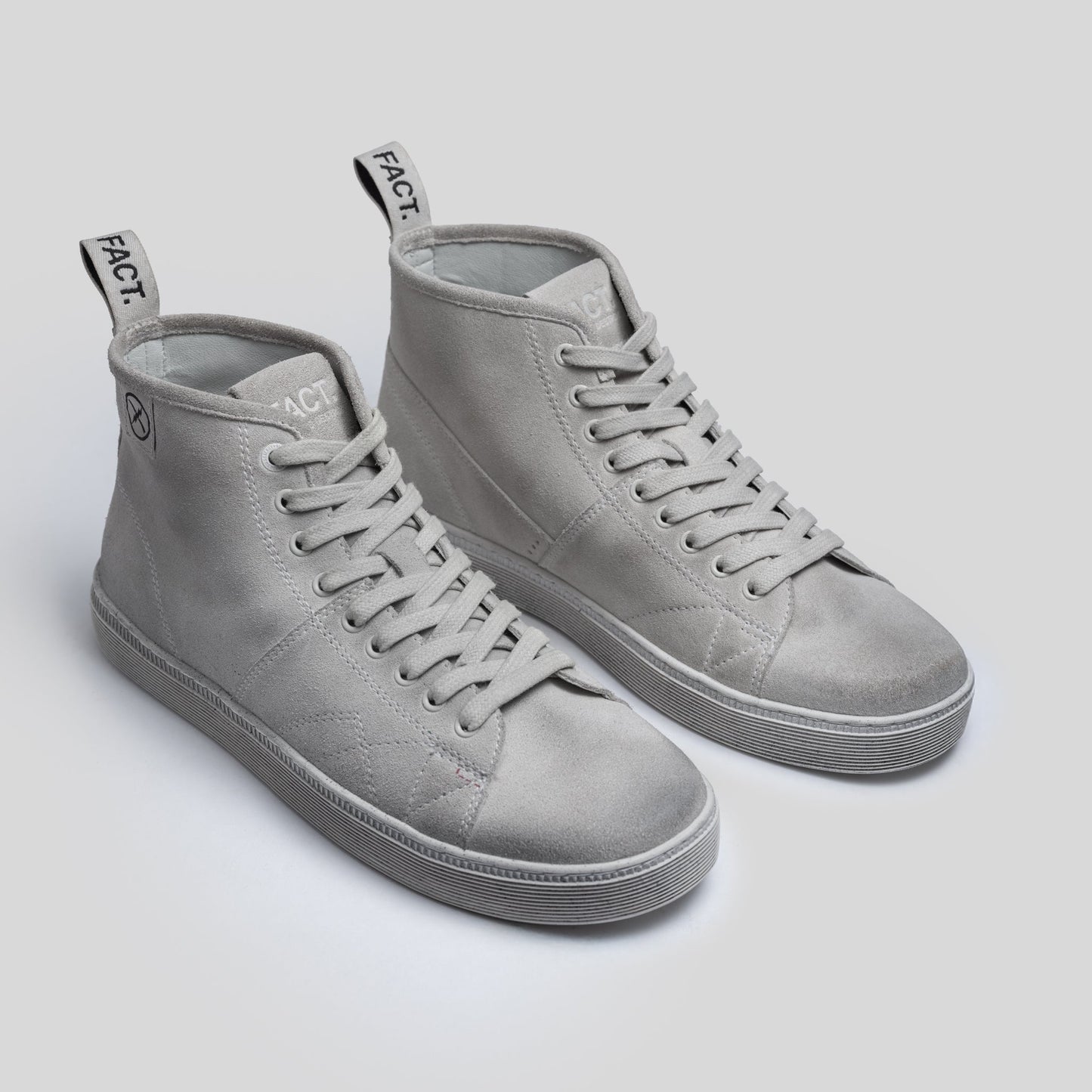 Editorial photo of the CNTRL boot by FACT. in Dirty White Suede