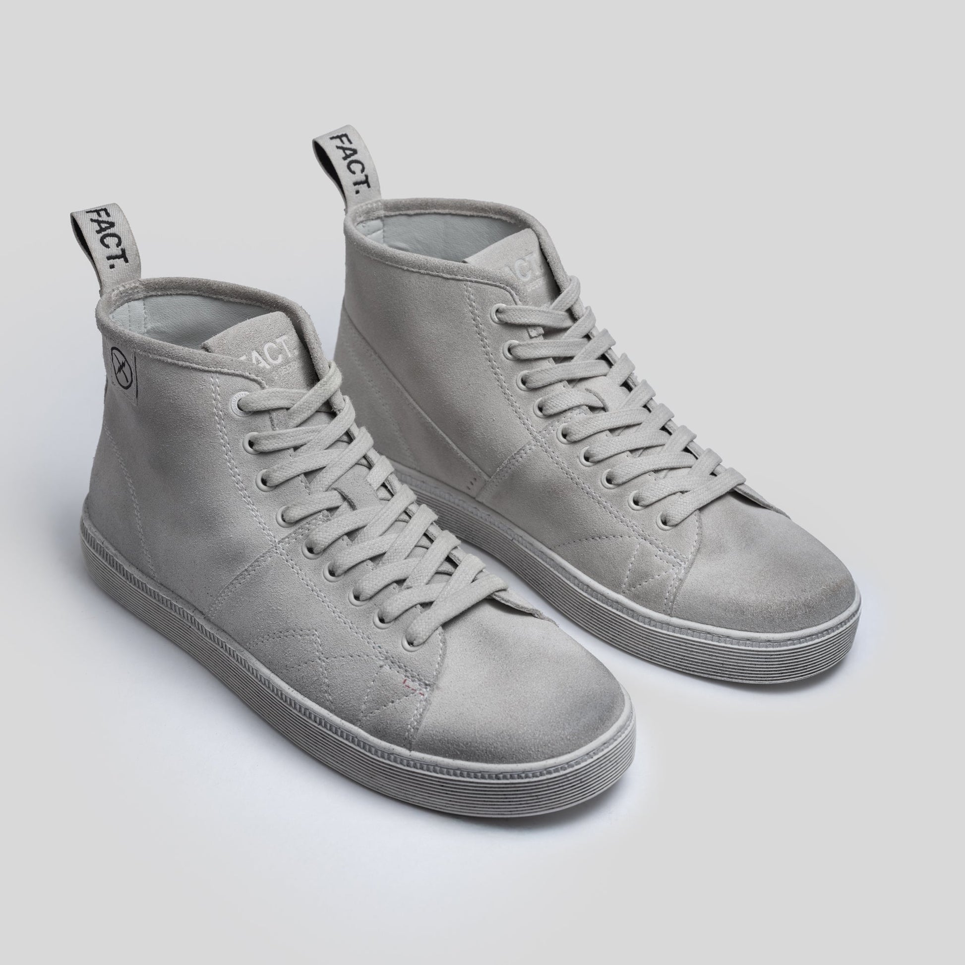 Editorial photo of the CNTRL boot by FACT. in Dirty White Suede
