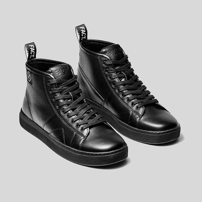 Editorial photo of the FACT. CNTRL cup sole monkey boot in black leather, shot in a studio environment.